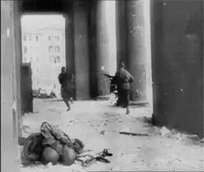 Soldiers Walking Through Tunnel GIF
