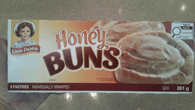 Someone Holding Box Of Honey Buns GIF
