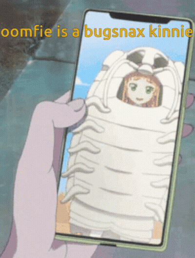 Someone Is Holding A Cell Phone With A Picture Of A Girl In A Bug Costume On It GIF
