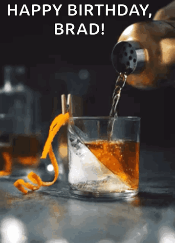 Someone Is Pouring A Drink Into A Glass With The Words Happy Birthday Brad GIF
