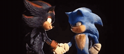 Sonic The Hedgehog And Shadow The Hedgehog Are Shaking Hands In A Dark Room . GIF