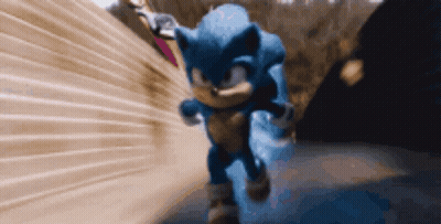 Sonic The Hedgehog Is Running Through A Tunnel With A Blurred Background GIF