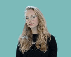 Sophisticated Female Pointing You're A Rockstar GIF