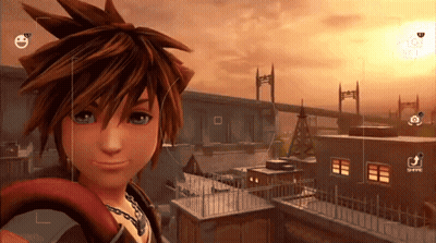 Sora From Kingdom Hearts Is Taking A Selfie With A Camera GIF