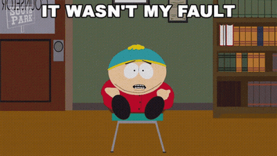 South Park Character Sits In Front Of It Wasn't My Fault Sign GIF
