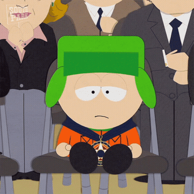 South Park Character Sitting In Chair Surrounded By People GIF
