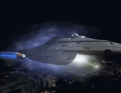 Space Ship Flying In Dark With Smoke GIF