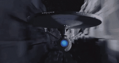Space Ship Flying With Beam Of Light GIF