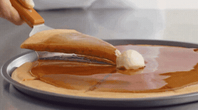 Spatula Spreading Butter On Pizza GIF