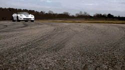 Speeding Car White Curve Slow Motion Loop GIF