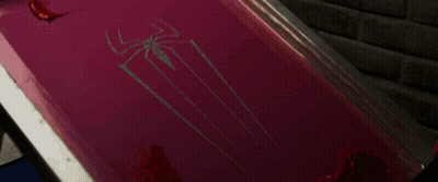 Spider-Man Logo On Pink Surface GIF