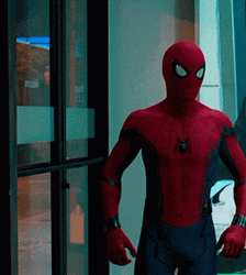 Spider Man Posing Beside Glass GIF