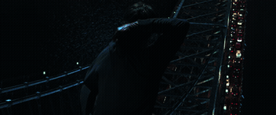 Spiderman Costume Man In Front Of City At Night GIF