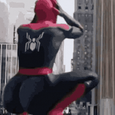 Spiderman Standing In Front Of Building GIF