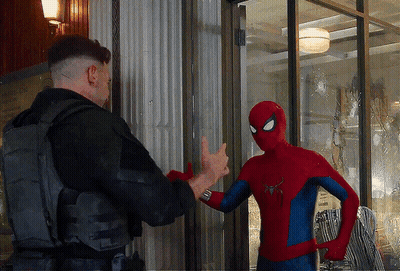 Spiderman Talking To Man In Black Vest GIF