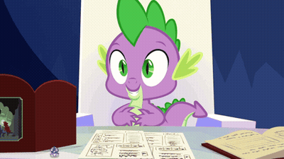 Spike From My Little Pony Sitting at Table With Book and Dice