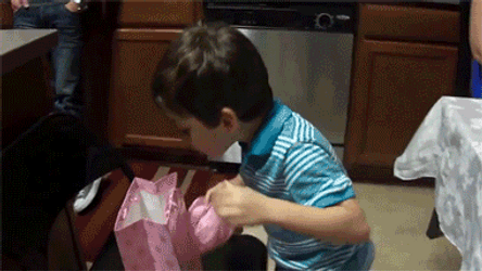 Spinning Banana Present For A Kid GIF