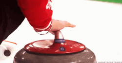 Spinning Red Curling Stone GIF