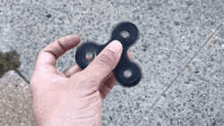 Spinning The Black Fidget Spinner GIF
