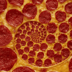 Spiral Spinning Peperoni Pizza GIF