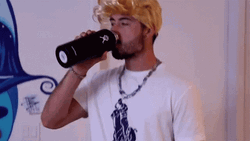 Spit Water Blonde Wig Guy GIF