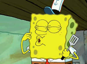 Spongebob Blowing Kisses Holding Spatula GIF | GIFDB.com