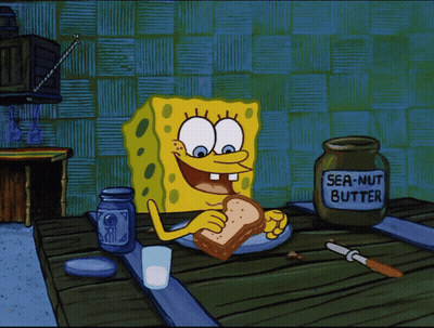 SpongeBob Eating Sandwich Next To Jar Of Peanut Butter GIF