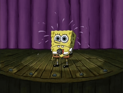 SpongeBob Holding Microphone On Stage GIF