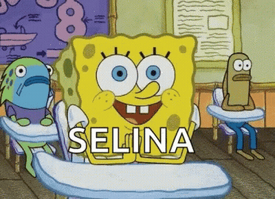 SpongeBob Sitting At Desk With Selina GIF