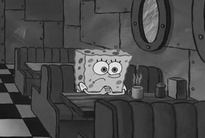 Spongebob Sitting At Diner Table With Coffee GIF