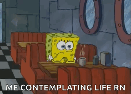 SpongeBob Sitting At Diner Table With Coffee GIF