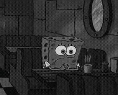 SpongeBob Sitting At Table With Coffee GIF