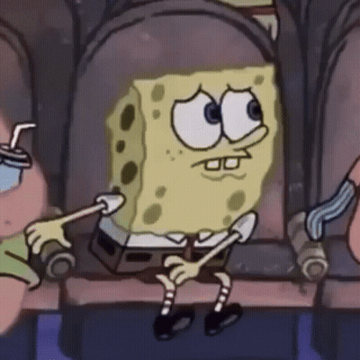 SpongeBob Sitting In Chair With Marshmallow Stick GIF