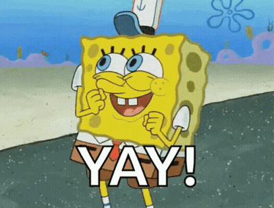 SpongeBob Smiling Holding Fist Up Saying Yay GIF