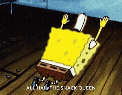 spongebob squarepants is laying on a wooden floor with the words `` all hail the snack queen '' .