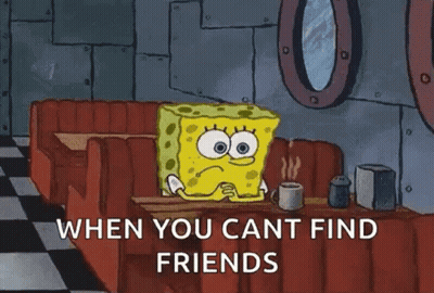 Spongebob Squarepants Is Sitting At A Table With A Cup Of Coffee . GIF