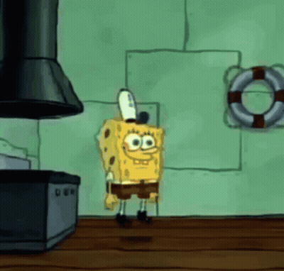 Spongebob Squarepants Is Standing In A Kitchen With A Life Preserver On The Wall Behind Him GIF