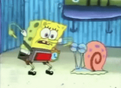 Spongebob Squarepants Is Standing Next To A Snail . GIF