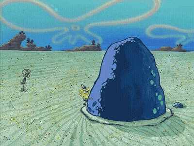 SpongeBob SquarePants Next To Large Rock GIF