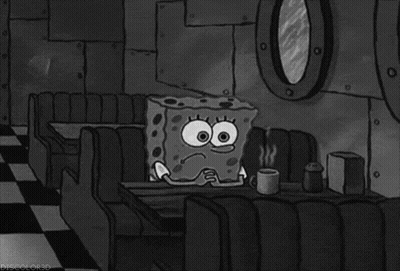 Spongebob Squarepants Sitting At Table GIF