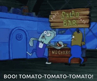 Spongebob Squarepants Standing in Front of Salad Bar