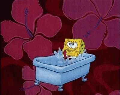 Spongebob Squarepants Taking A Bath In Front Of Pink Flower GIF