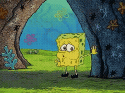 SpongeBob Standing In Front Of Rock GIF