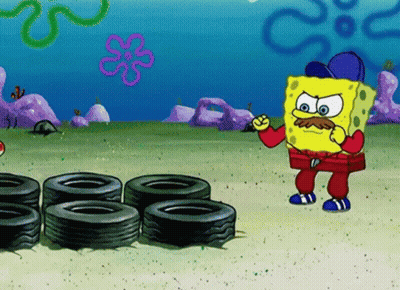 SpongeBob Standing In Front Of Tires GIF