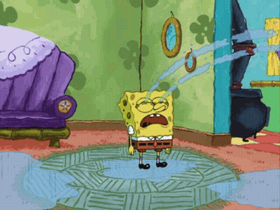 SpongeBob Standing In Room With Purple Couch GIF
