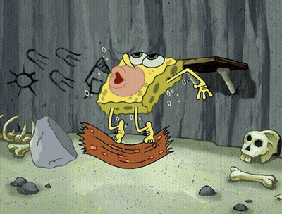 SpongeBob Standing On Rug With Skulls And Rocks GIF
