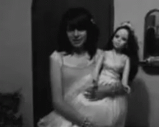 Spooky Friday Doll Turning Its Head GIF