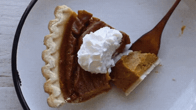 Spreading Butter On Cinnamon Roll With THC Butter Caption GIF