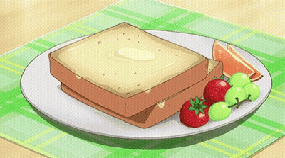 Spreading Butter On Toast With Fruit GIF