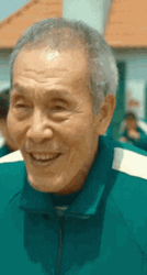 Squid Games Oh II-Nam Smiling GIF